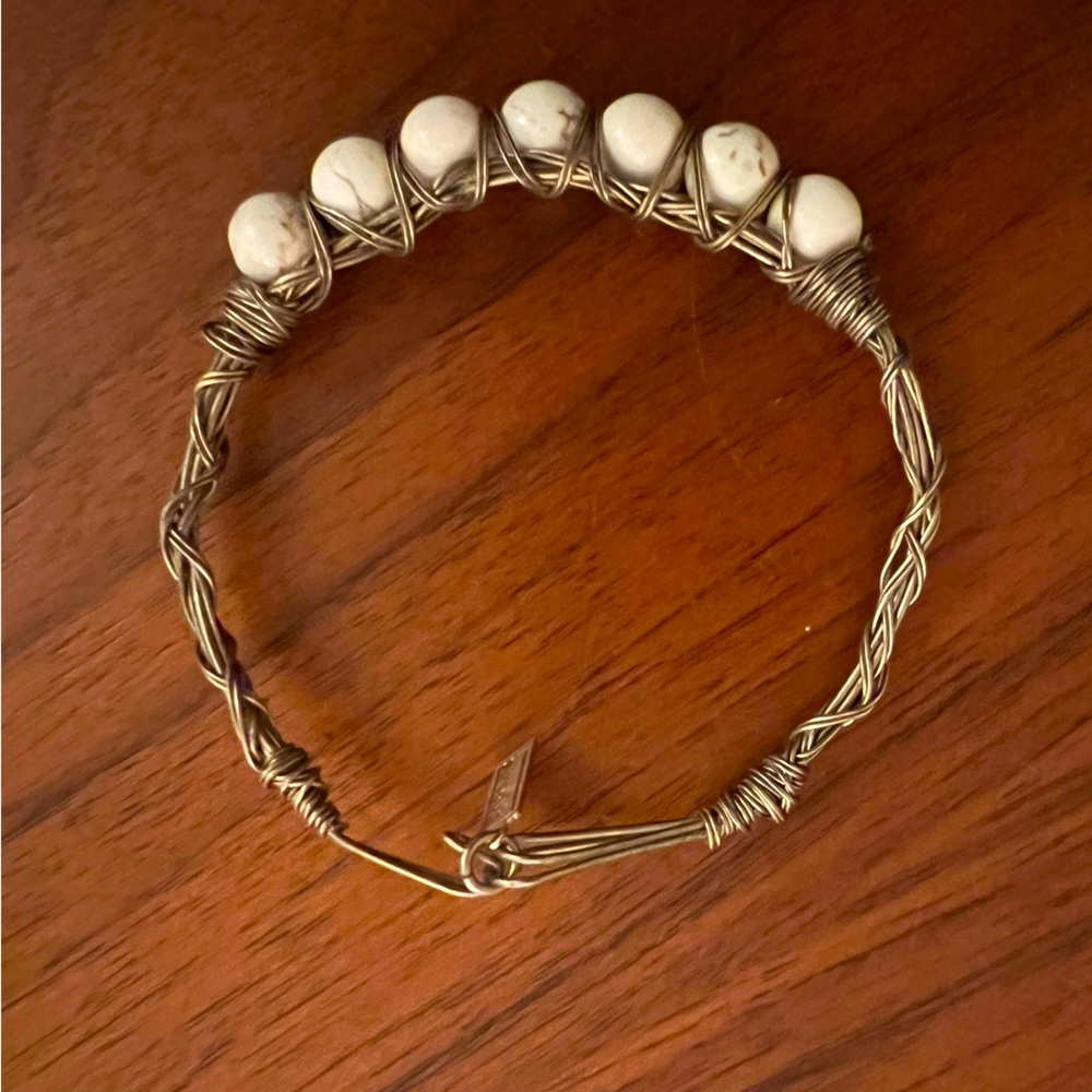 Wire and white marbled bead bracelet. Canvas brand.